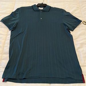 Salvatore Ferragamo - Green sort of teal color.  Unique.